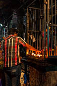 Worship and puja offerings inside the Swamimalai temple.